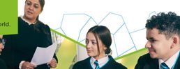 Teacher and 3 students discussing in class with geometric shape outlines in the background and text: Made for Wales.